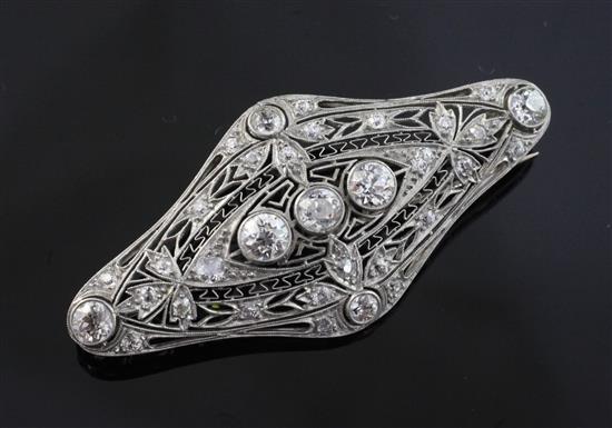 A 1920s platinum and gold, diamond set brooch, 2.25in.